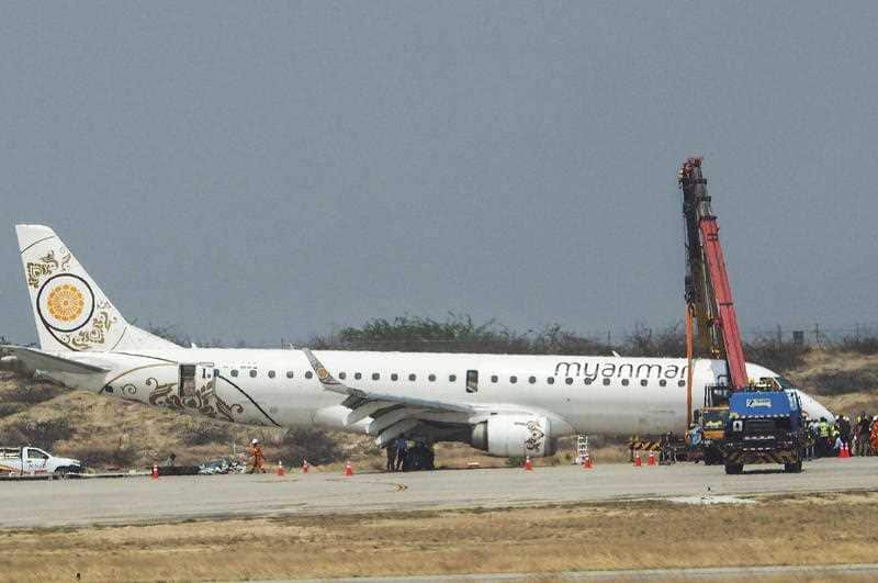 Myanmar National Airlines carrying 82 passengers and 7 crews on board successfully landed without front wheels.