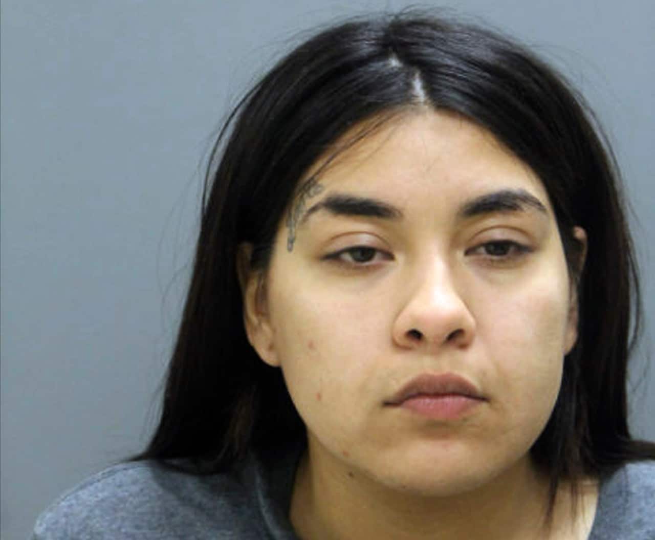 In this booking photo provide by the Chicago Police Department Thursday, May 16, 2019, is Desiree Figueroa, 24, who is charged in the death of the missing 19-year-old expectant mother, Marlen Ochoa-Lopez.