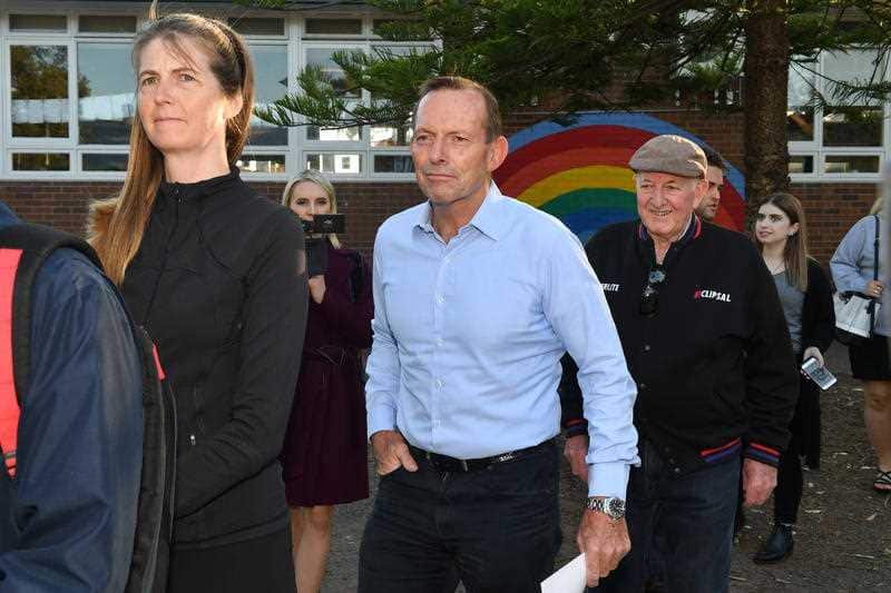 Tony Abbott voting on election day.