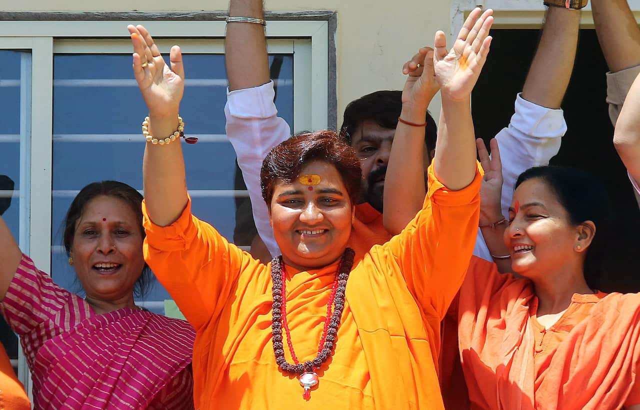 BJP candidate Sadhvi Pragya reacts as votes are counted for the Lok Sabha election in Bhopal.