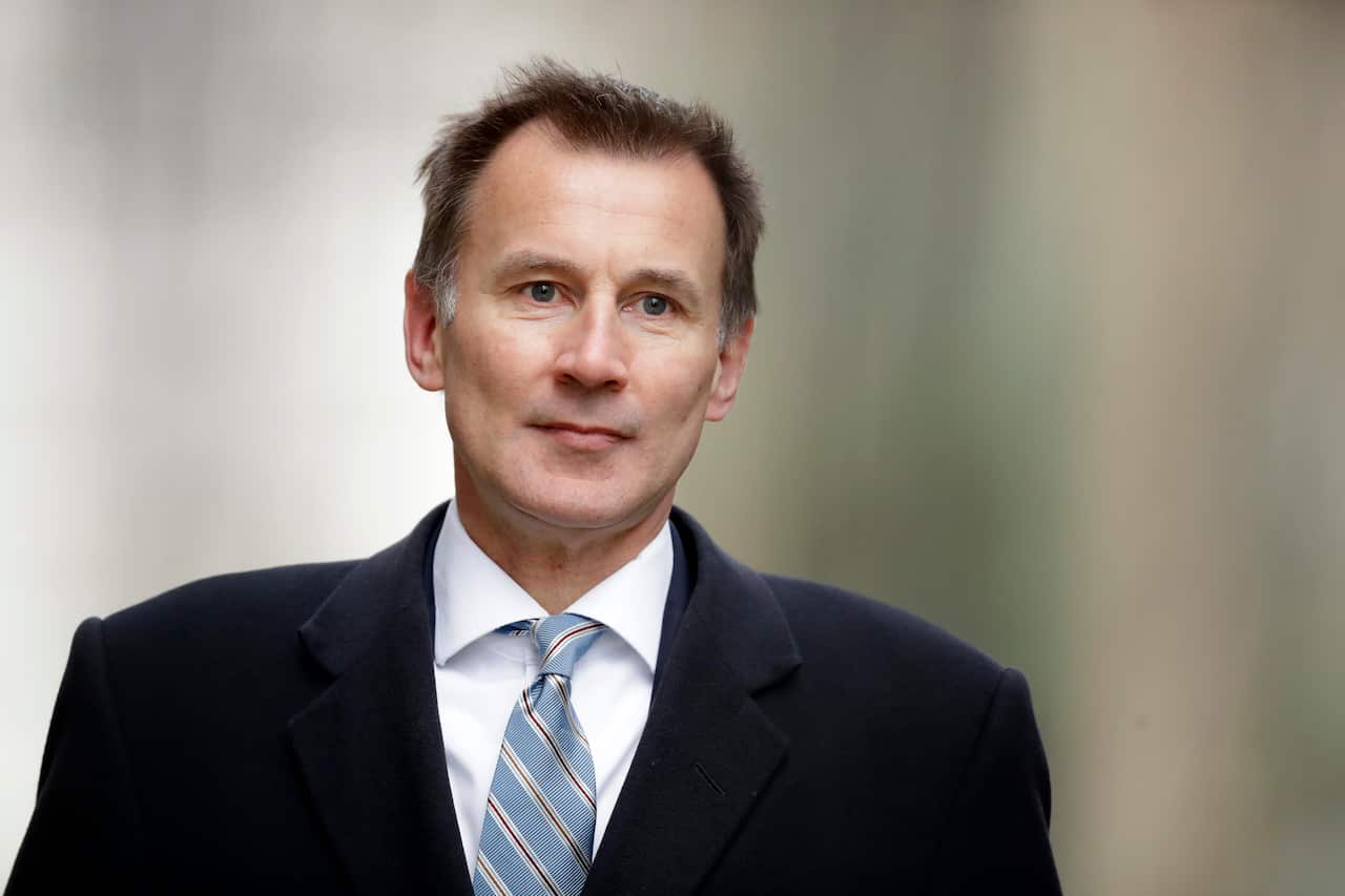 Britain's Foreign Secretary Jeremy Hunt arrives for a cabinet meeting at 10 Downing Street.