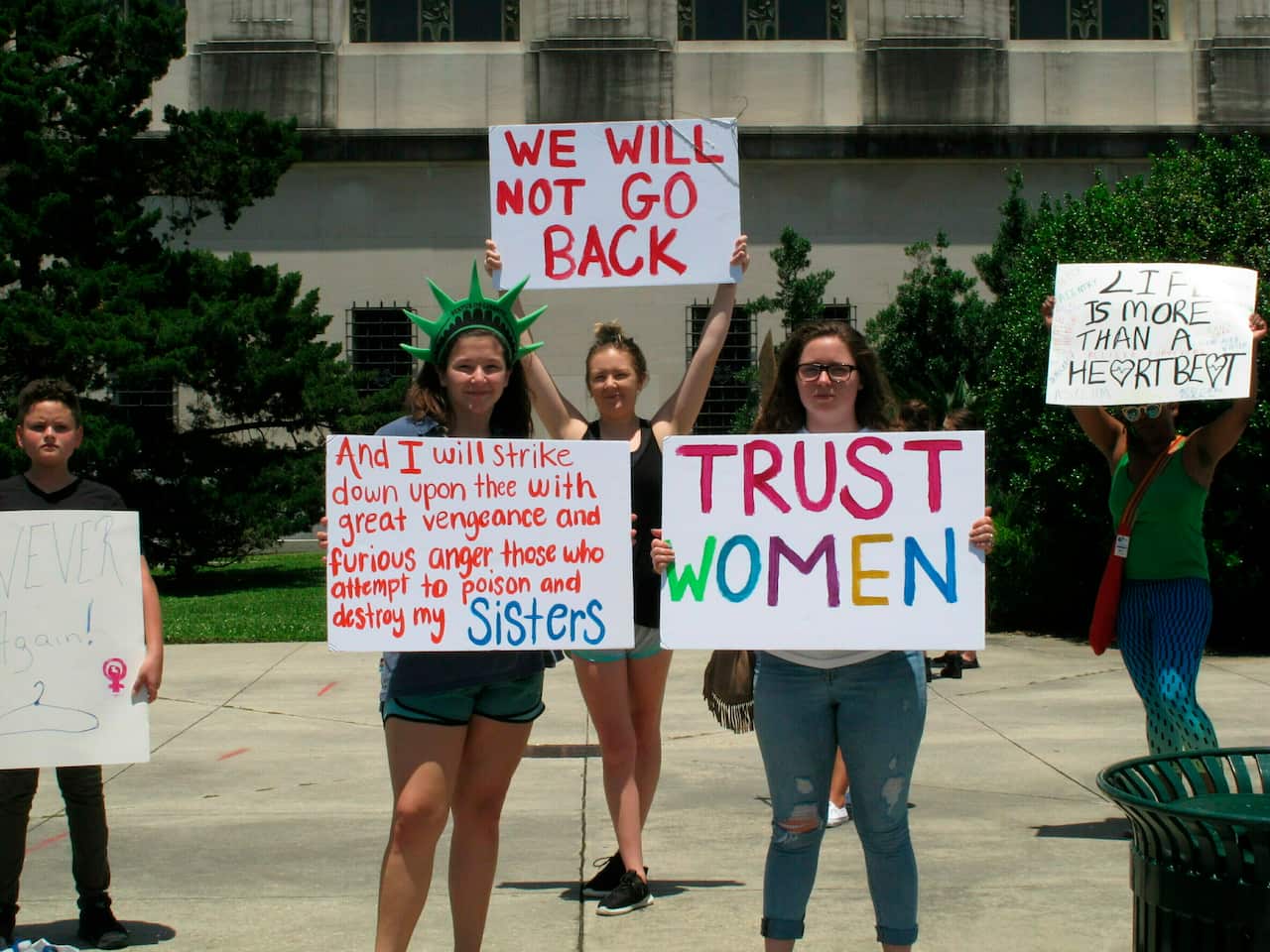 Abortion rights supporters protest in Louisiana, where lawmakers have passed a bill that would ban abortion as early as six weeks of pregnancy.