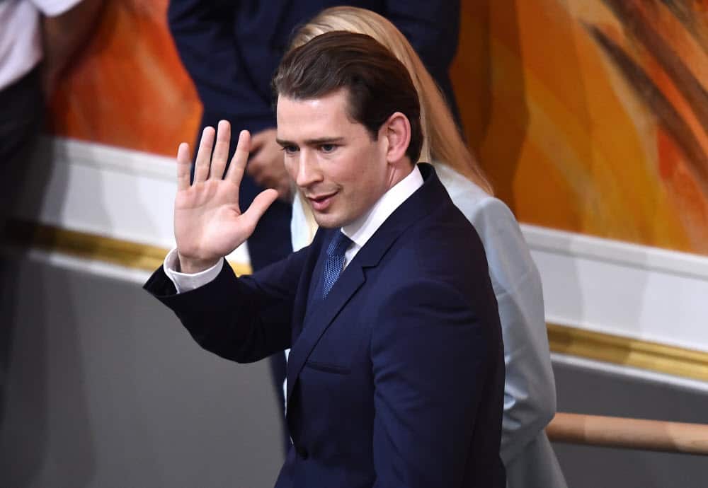 Austrian Chancellor Sebastian Kurz leaves parliament after losing a no-confidence vote