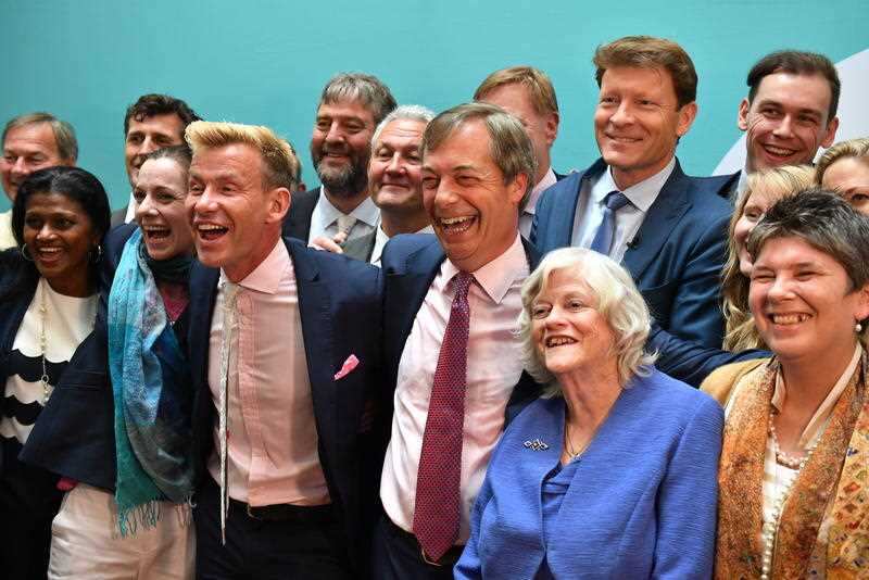 Brexit Party leader Nigel Farage with the Brexit party MEPs during a post election press conference