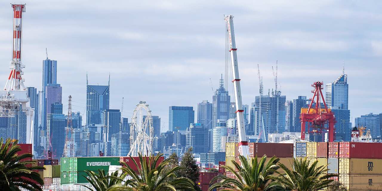 The Melbourne city skyline and shipping docks are seen from Yarraville, Melbourne, Sunday June 2, 2019. The Australian Bureau of Statistics will release the quarterly balance of payments on Tuesday, June 4, 2019.  (AAP Image/Ellen Smith) NO ARCHIVING