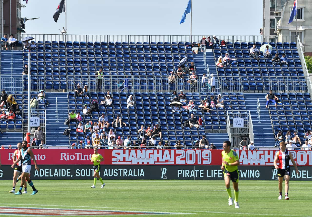 Crowds watch the 2019 Round 11 AFL match between the St Kilda Saints and Port Adelaide Power at Jiangwan Stadium.