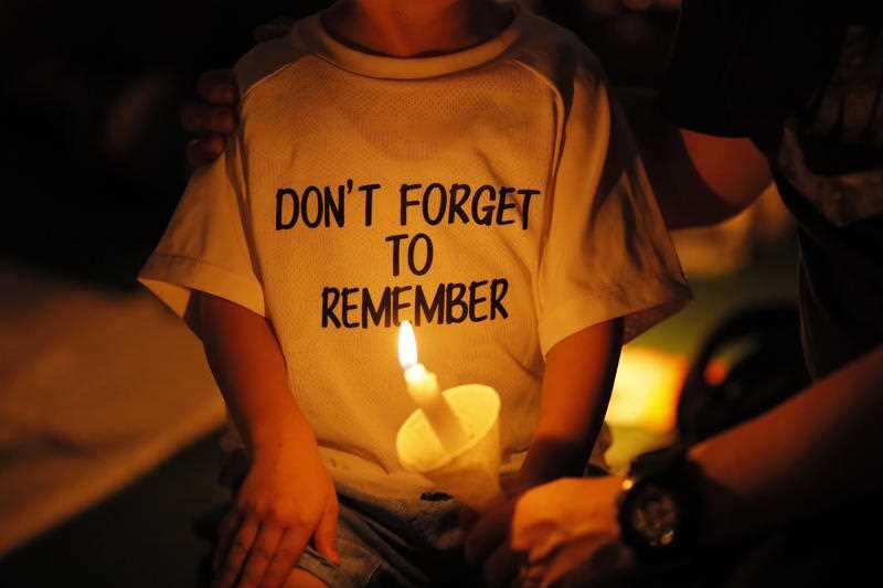 One of the thousands of people that attended last year's candlelight vigil