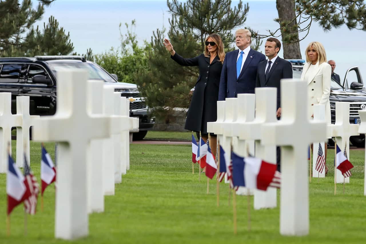 US First Lady Melania Trump, US President Donald Trump, French President Emmanuel Macron and French President's wife Brigitte Macron.