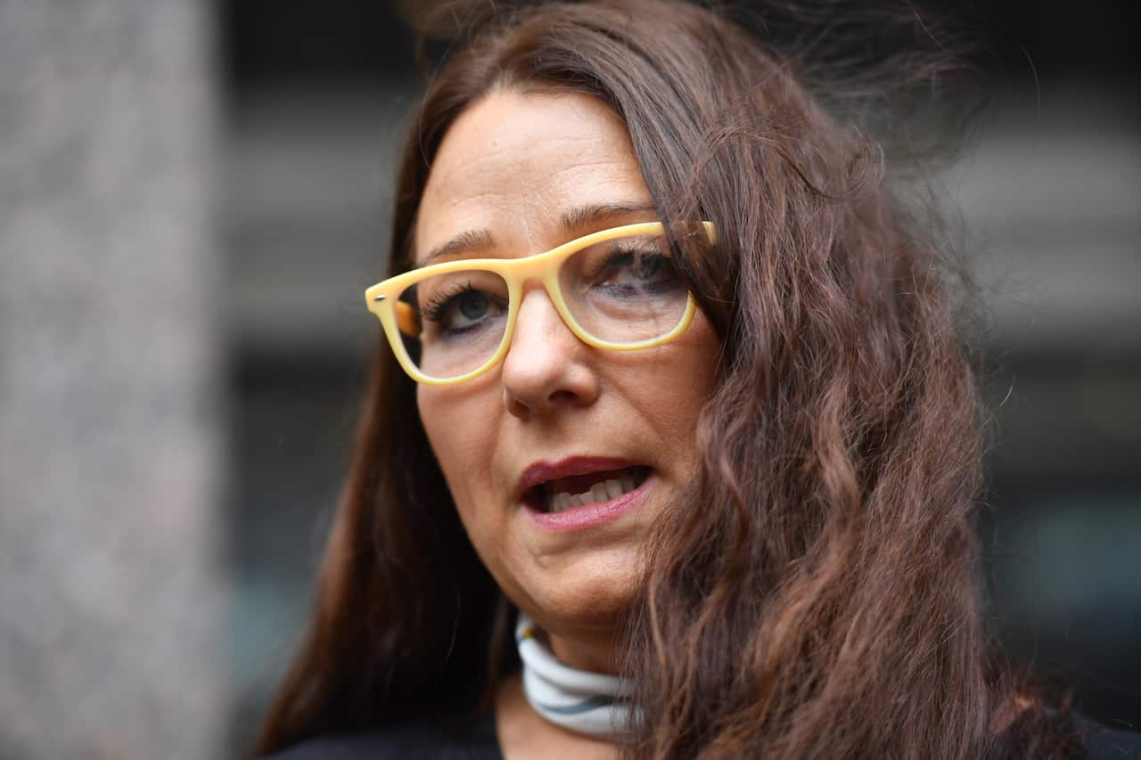 Anderton Park head teacher Sarah Hewitt-Clarkson speaks to the media outside the Priory Law Courts in Birmingham.