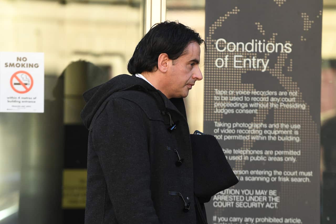 Alvaro Gonzalez arrives to the County Court of Victoria in Melbourne, Tuesday, June 11, 2019. Josie and Alvaro Gonzalez are accused of scamming $17 million out of an insurance company. (AAP Image/James Ross) NO ARCHIVING