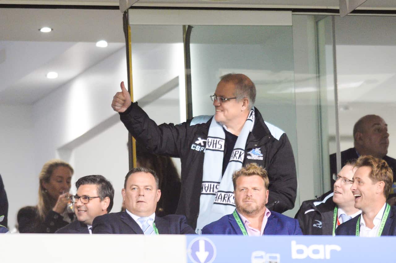 Scott Morrison attends a Cronulla Sharks away game against the Canberra Raiders.