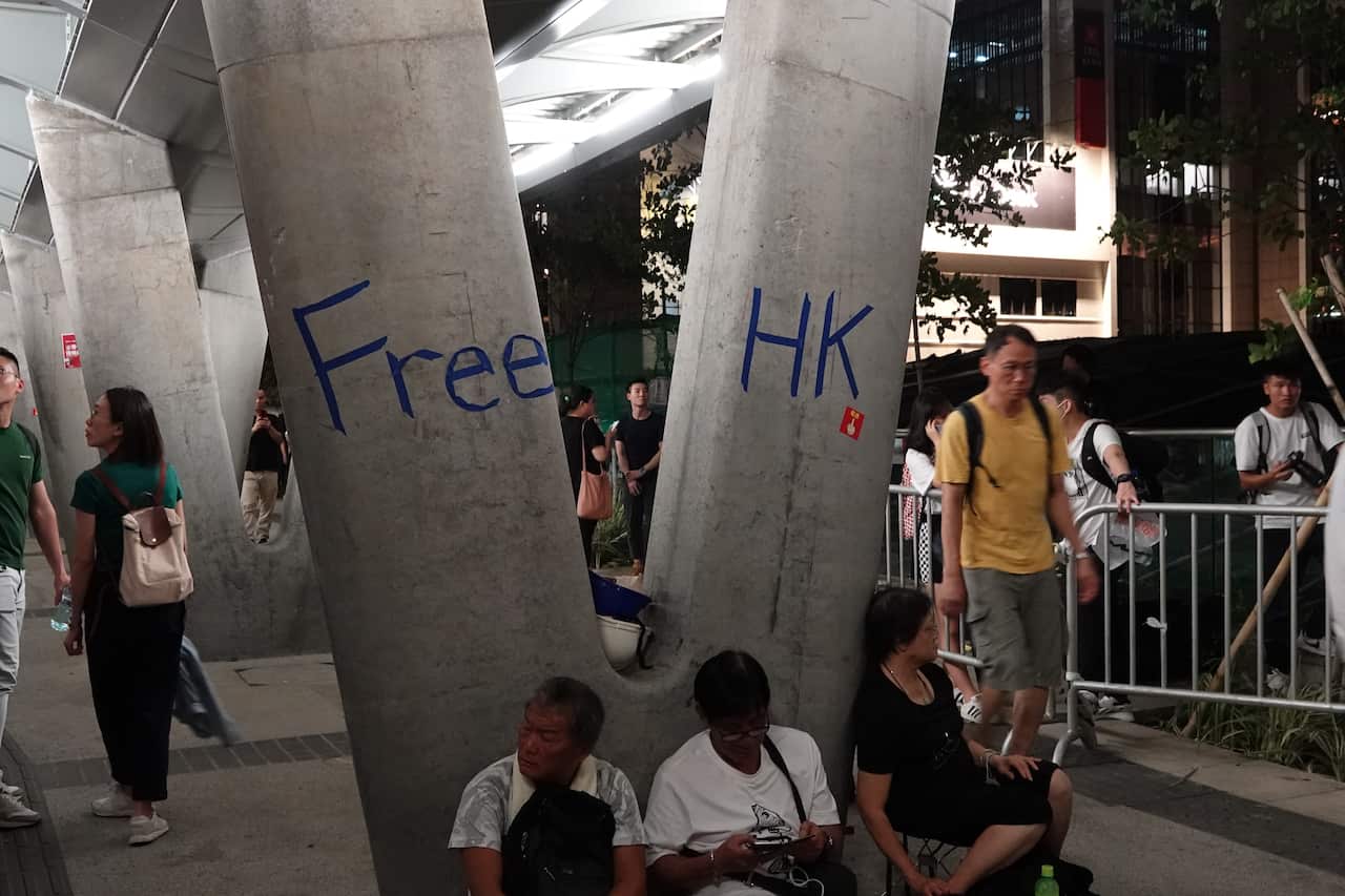 Free HK seen on pillars next to the Legislative Council Complex after violent clashes.Thousands of protesters clashed with the police after the government refused to back down on the extradition bill