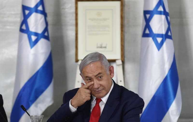 Israeli Prime Minister Benjamin Netanyahu at the unveiling of the new "Trump Heights" settlement