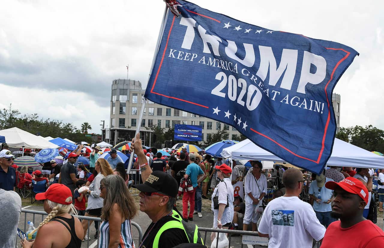 Supporters of President Trump line up outside the Amway Center in Orlando, Florida.