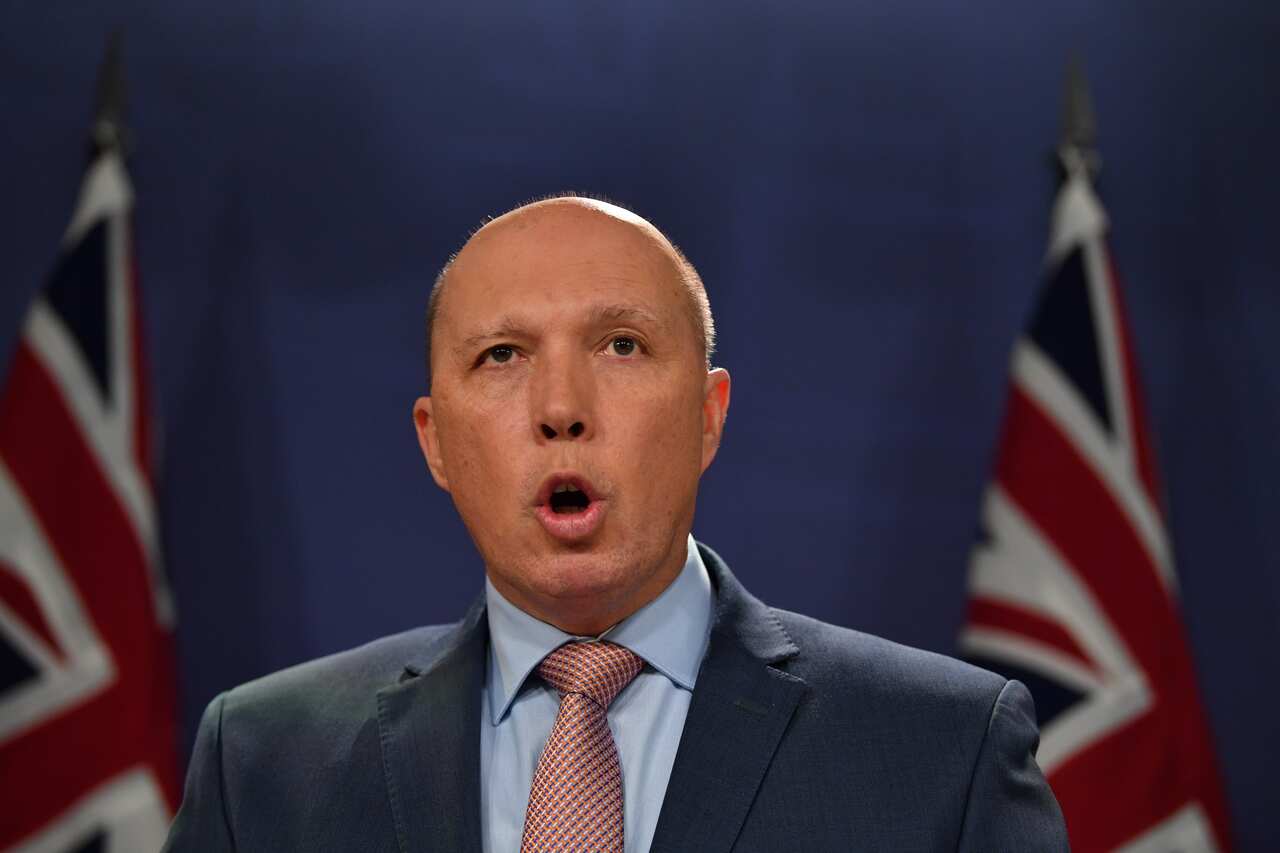 Minister for Home Affairs Peter Dutton speaks to the media during a press conference in Sydney, Thursday, June, 20, 2019. (AAP Image/Dean Lewins) NO ARCHIVING