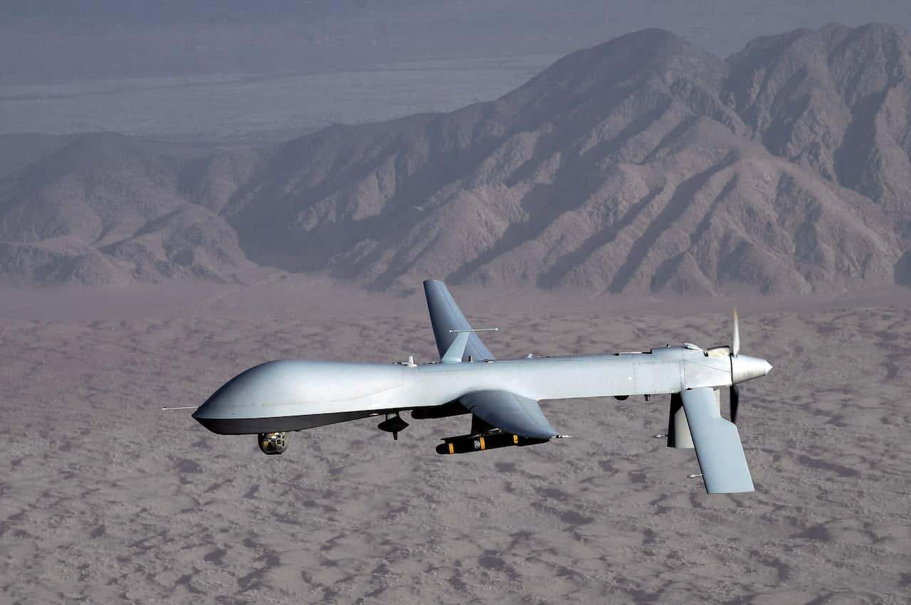 An undated handout photo made available by the US Air Force shows a MQ-1 Predator unmanned aircraft in flight at an undisclosed location.