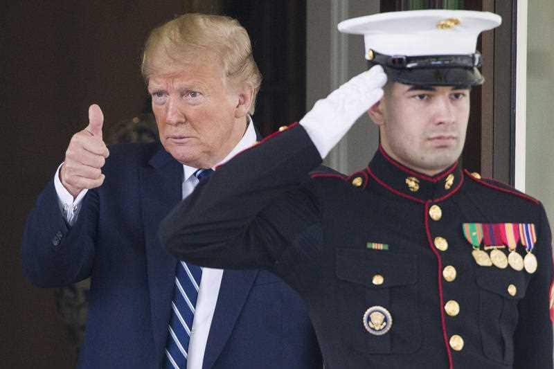 President Donald Trump gives thumbs up to media outside the White House, Thursday, June 20, 2019.