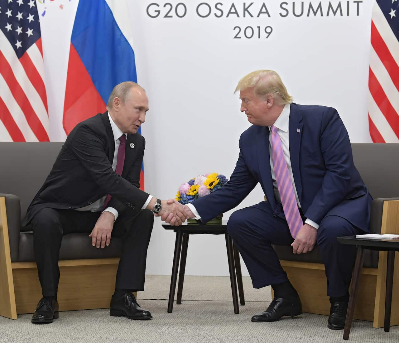 Russian President Vladimir Putin and then-US President Donald Trump during the 2019 G20 Summit in Japan.