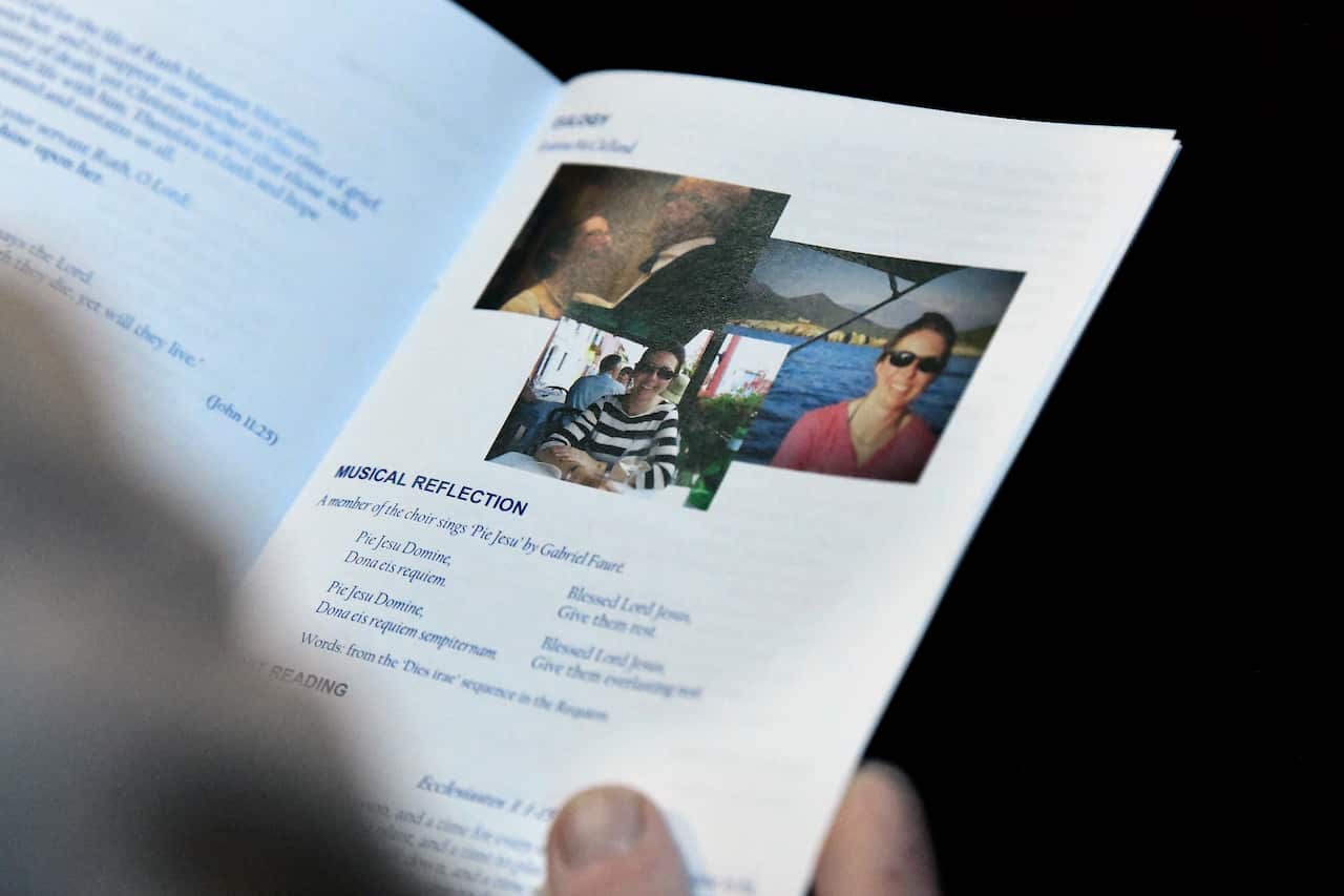 A mourner holds an order of service booklet during the Memorial Service for parishioner and Australian climber Ruth McCance at St James' Church in Sydney