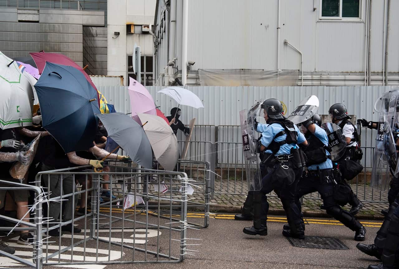 Police take charge against protesters.