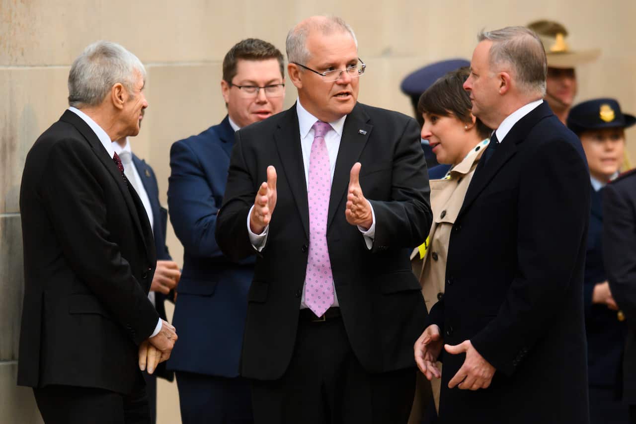Kerry Stokes, Prime Minister Scott Morrison and Opposition Leader Anthony Albanese ahead of the Last Post Ceremony at the Australian War Memorial in Canberra, Monday, July 1, 2019. (AAP Image/Rohan Thomson) NO ARCHIVING