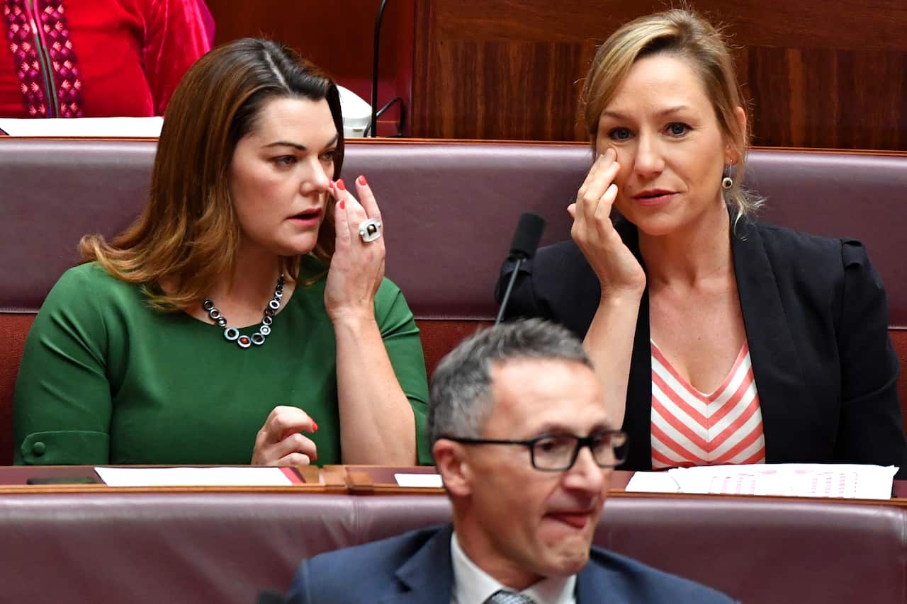 Senator Sarah Hanson-Young, Senator Larissa Waters and Senator Richard Di Natale are seen during the swearing in to mark the start of the 46th Parliament at Parliament House in Canberra, Tuesday, 2 July 2019. (AAP Image/Sam Mooy) NO ARCHIVING