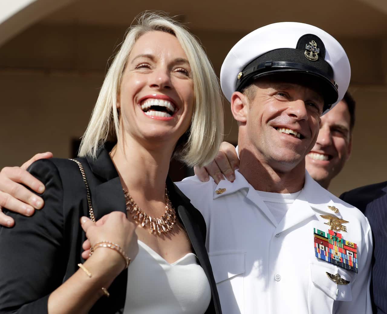 Navy Special Operations Chief Edward Gallagher and his wife Andrea Gallagher leave his court martial.