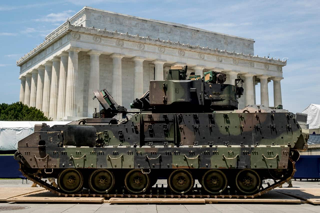 One of two Bradley Fighting Vehicles waits to be driven into place in front of the Lincoln Memorial.