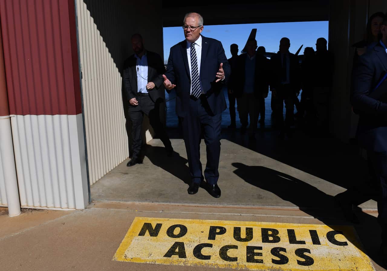 Prime Minister Scott Morrison leaves after a press conference at the Royal Doctors Flying Service airport hanger in Dubbo, 390km north west of Sydney, Thursday, July 18, 2019. (AAP Image/Mick Tsikas) NO ARCHIVING