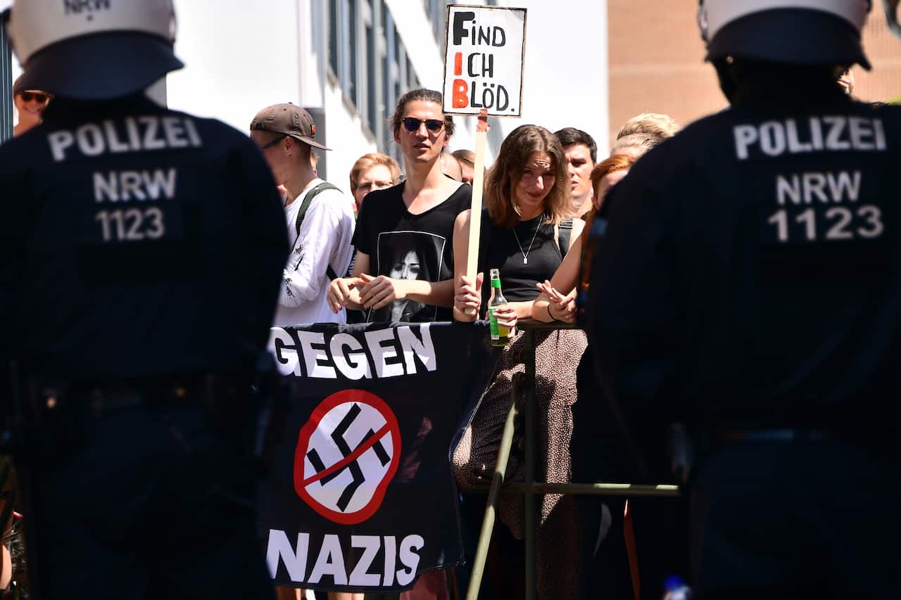 Anti-Nazi protesters and police are seen in Halle, Germany.
