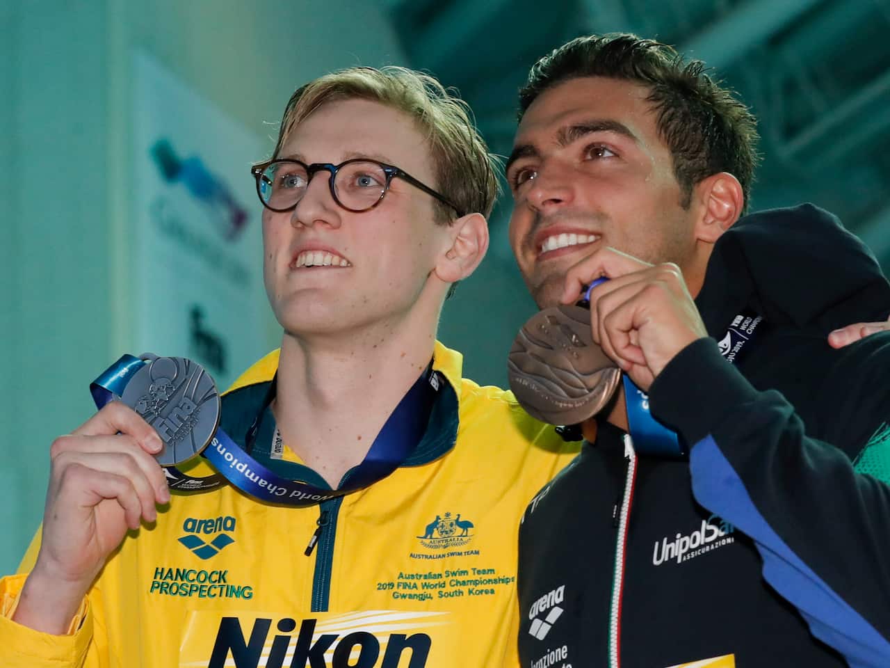 Mack Horton was happy to pose Italy's Gabriele Detti, who won bronze. 
