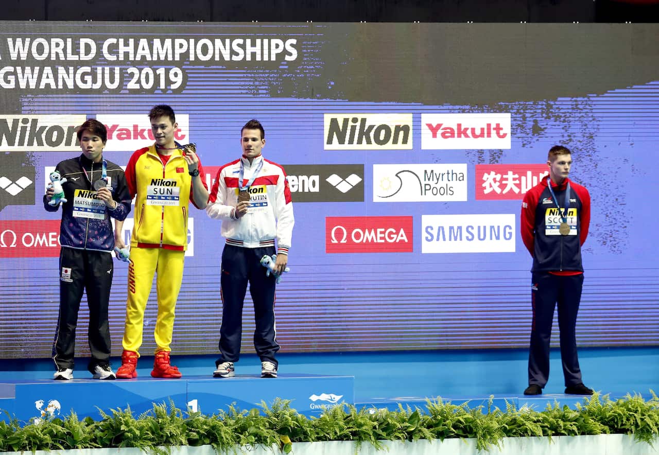 Gold medalist Sun Yang, silver medalist Katsuhiro Matsumoto of Japan and joint bronze medal winners Martin Malyutin of Russia and Duncan Scott Britain.