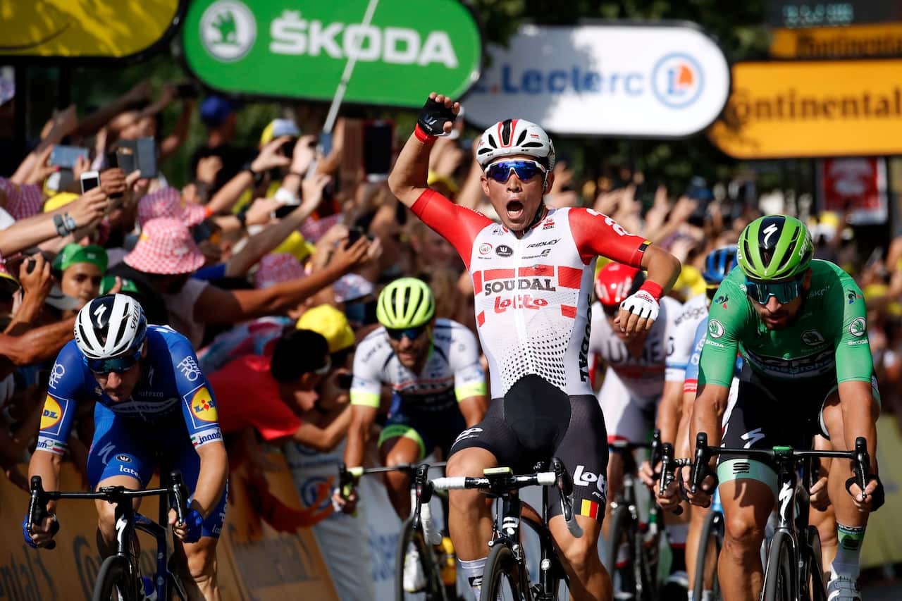 Australia's Caleb Ewan celebrates as crosses the finish line with Slovakia's Peter Sagan to win the sixteenth stage of the Tour de France 