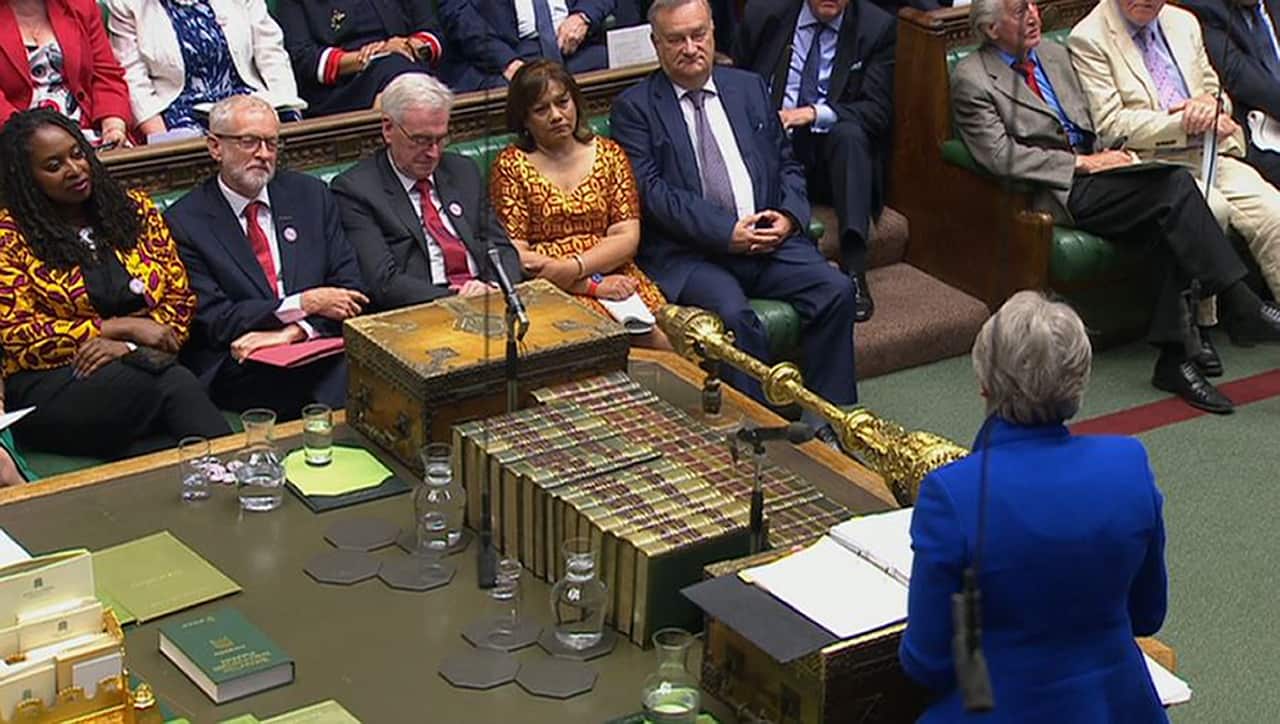 Labour leader Jeremy Corbyn listens to Prime Minister Theresa May during her last Prime Minister's Questions.