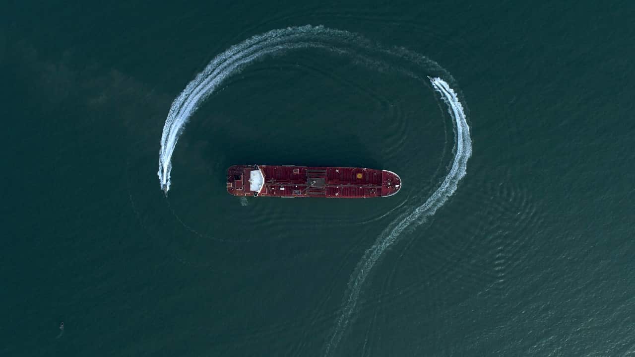 A speedboat of Iran's Revolutionary Guard moves around the oil tanker Stena Impero last month.