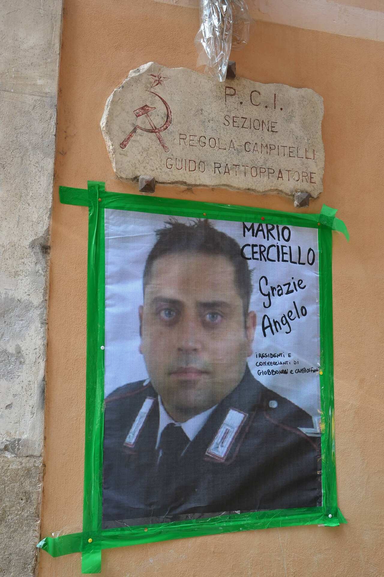 A tribute at Carabinieri station in Piazza Farnese to policeman Mario Cerciello Rega who was murdered whilst trying to make an arrest in the centre of Rome..