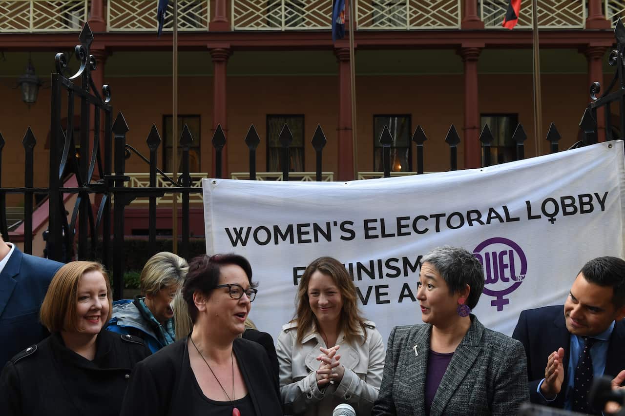 "It's not a left or right issue". NSW Labor MP Penny Sharpe addresses pro-choice supporters alongside Greens MP Jenny Leong outside the NSW Parliament.