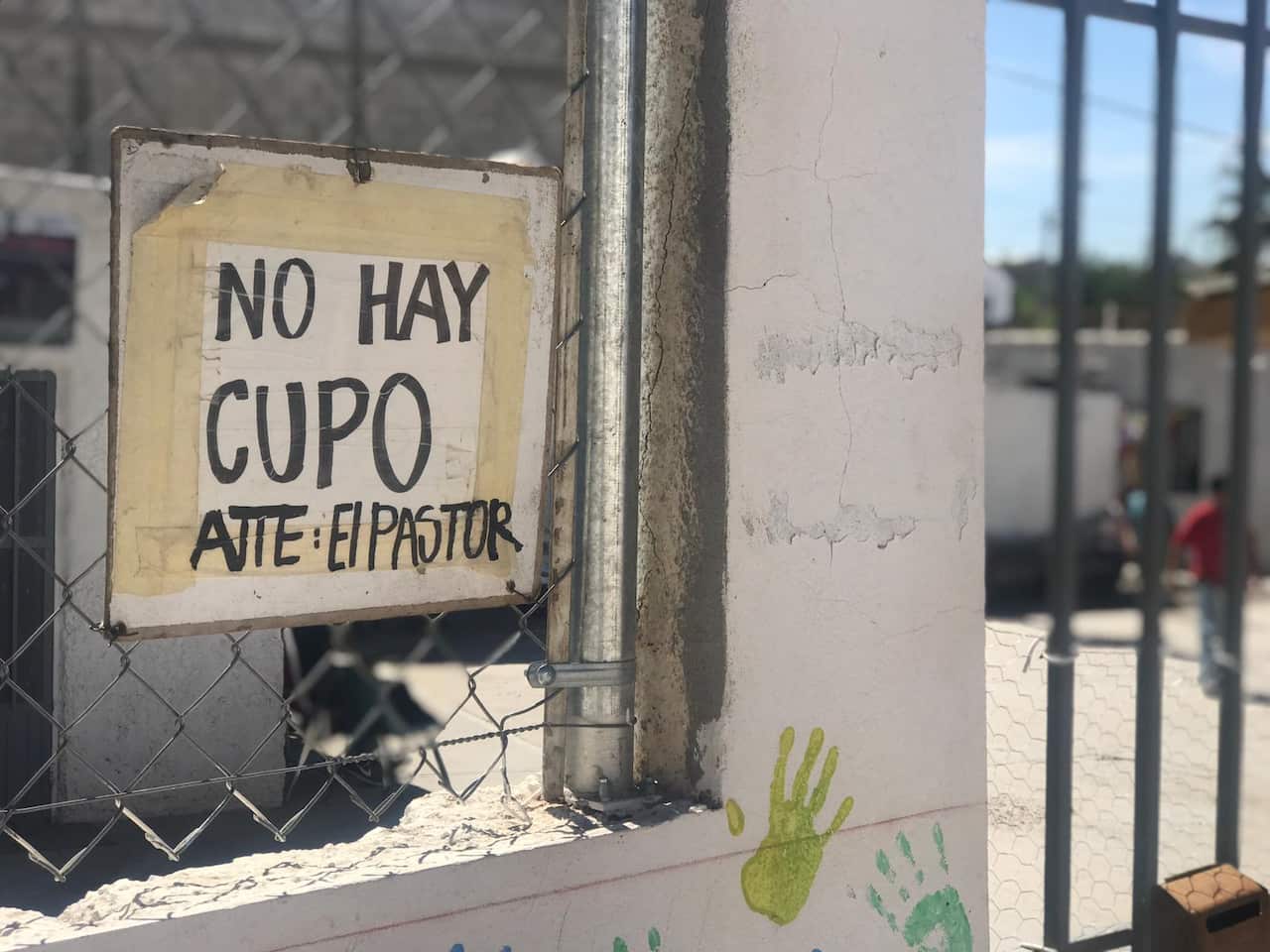 A sign in front of a migrant shelter in Ciudad Juárez, Mexico, informs asylum seekers that they have no space,