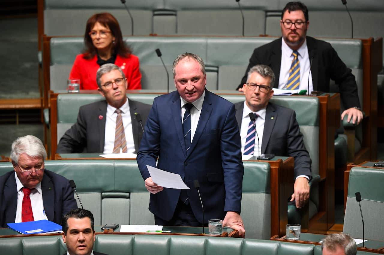 Nationals MP Barnaby Joyce makes a statement ahead of House of Representatives Question Time at Parliament House in Canberra, Thursday, August 1, 2019. (AAP Image/Lukas Coch) NO ARCHIVING