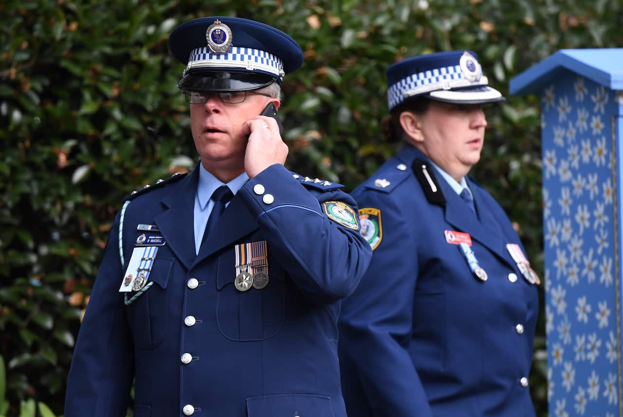 Friends, family and senior police arrive for the memorial service for Lucas Fowler.