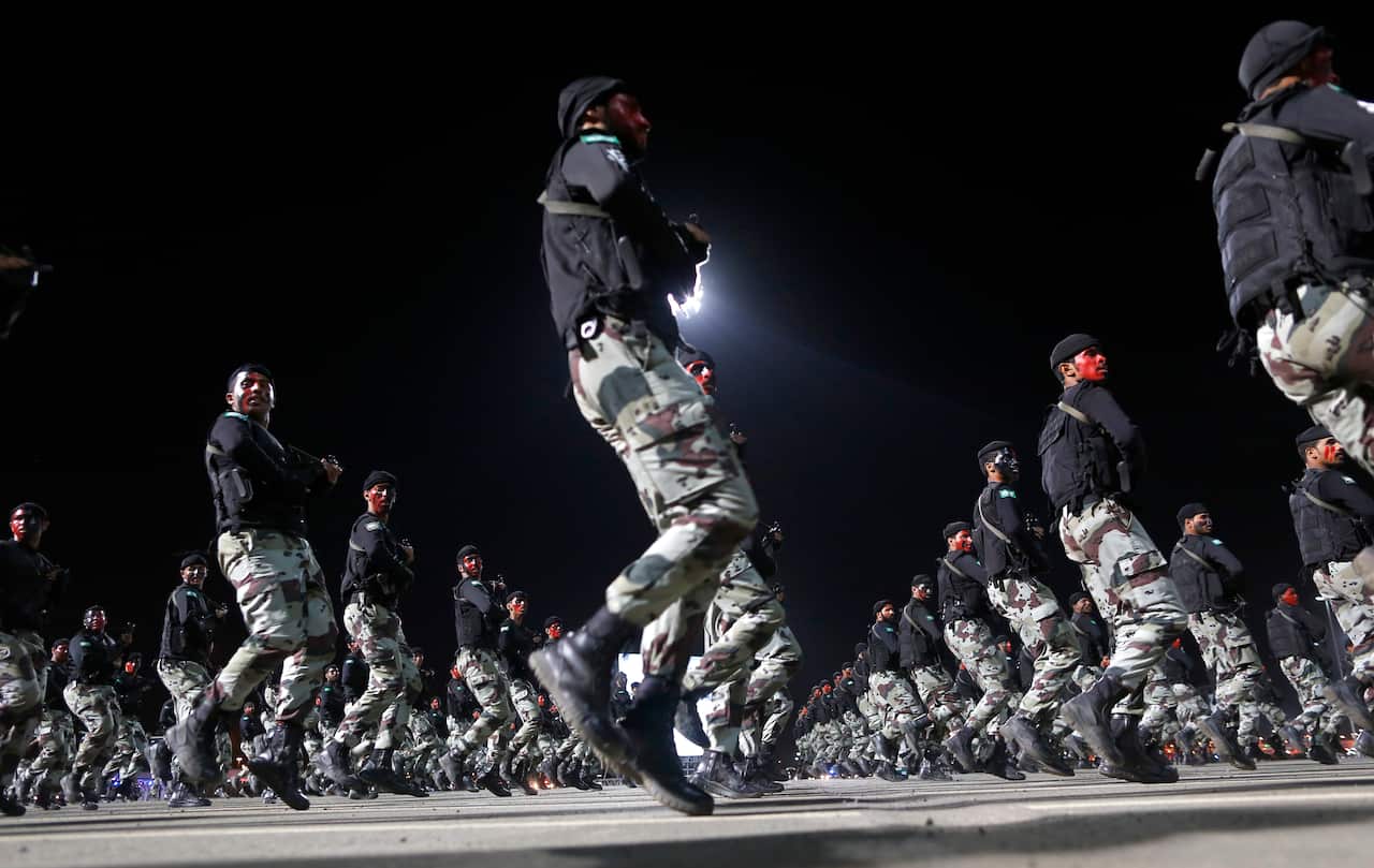 Saudi special forces perform during a military parade in preparation for the annual Hajj pilgrimage, in the Muslim holy city of Mecca, Saudi Arabia.