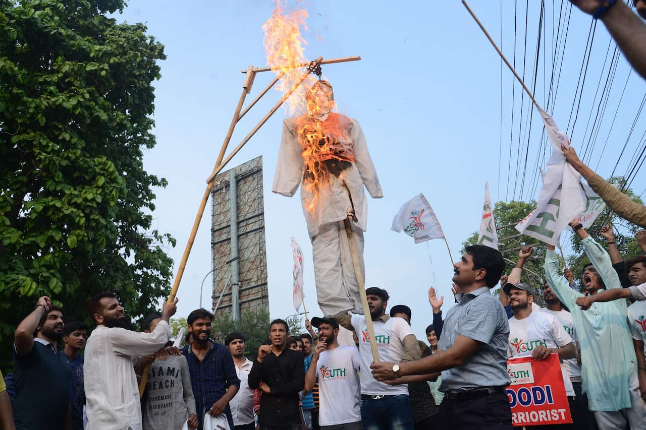 Activists of Youth Forum for Kashmir burns Indian PM Modi effigy in reaction to the move by India to abolish Kashmir's special status. 