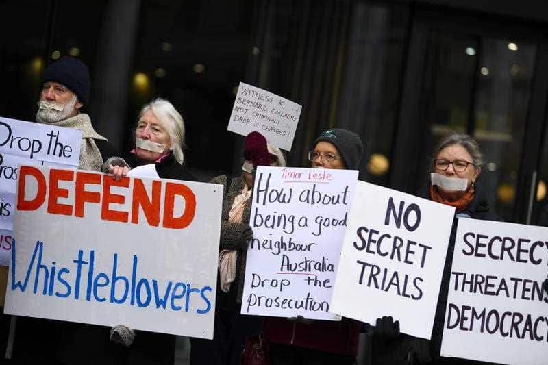Supporters of lawyer Bernard Collaery and 'Witness K' stage a protest outside the Supreme Court.