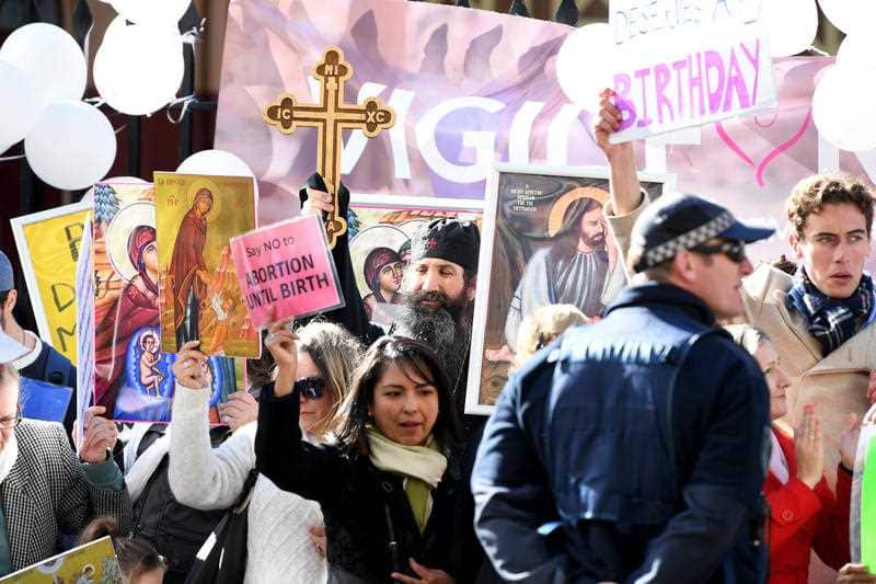Anti-abortion protesters gather outside NSW Parliament.