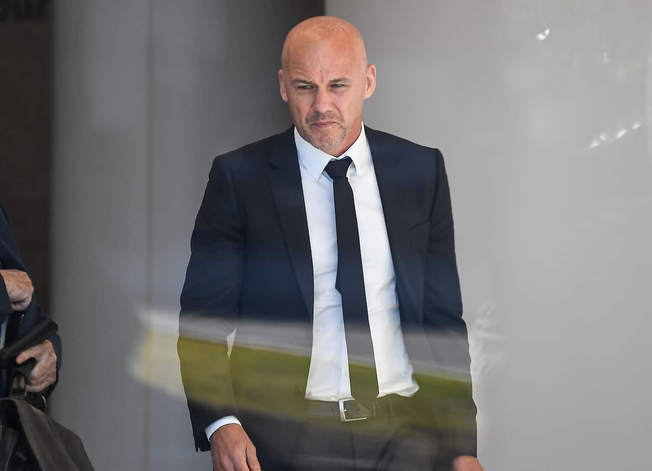 Former NSW Detective Gary Jubelin arrives at the NSW Coroners Court in Sydney.