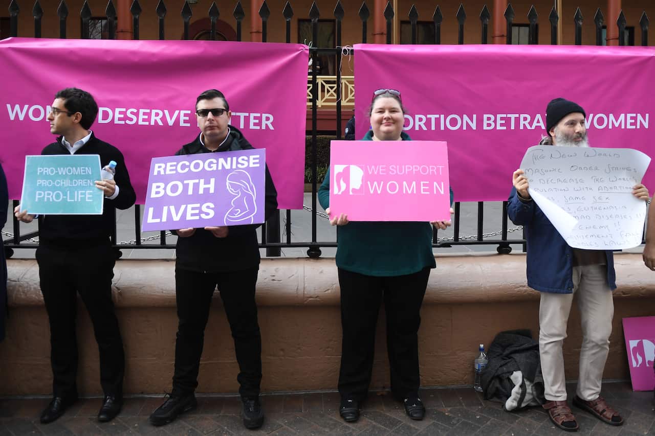 A small group of anti abortion protesters rally outside NSW State Parliament during the Reproductive Health Care Reform Bill 2019 debate.