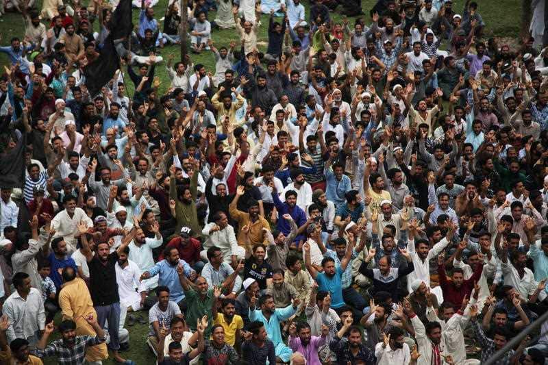 Kashmiri Muslims shout slogans during a protest in Srinagar
