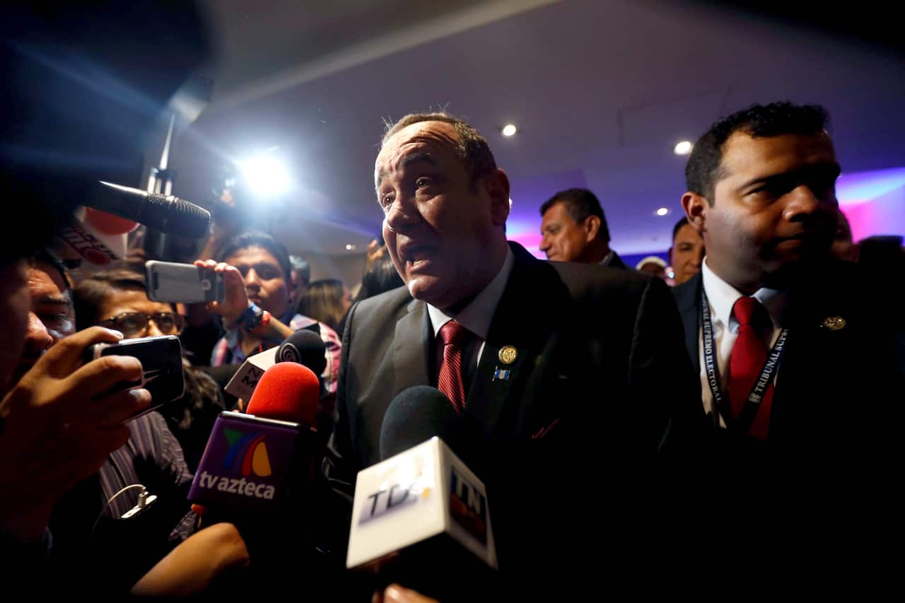 Alejandro Giammattei speaks during a press conference after the preliminary results of the elections, in Guatemala City.