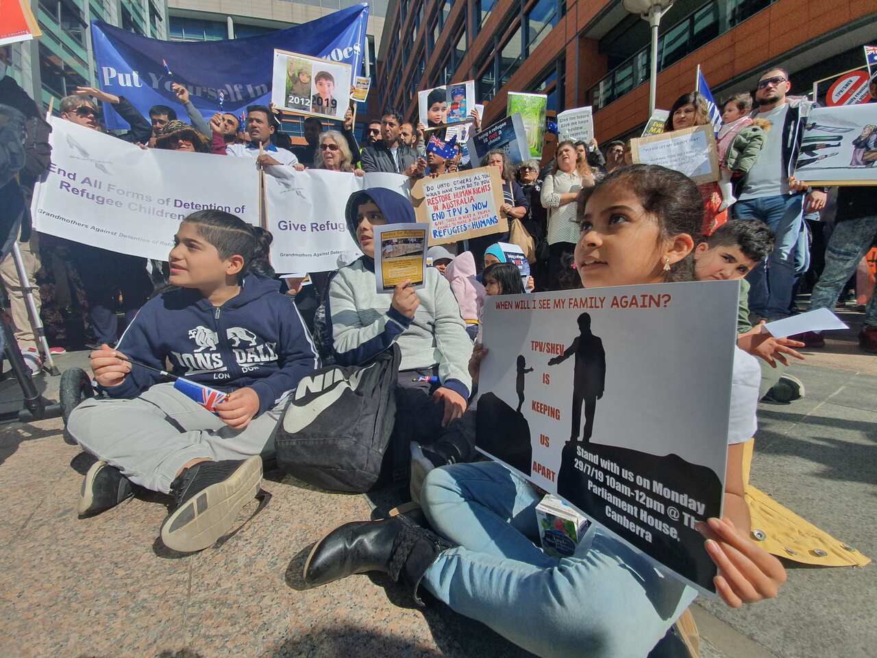 Chants of "justice for refugees" ring out as protesters gather outside the inner Sydney office of the Department of Immigration and Border Protection.