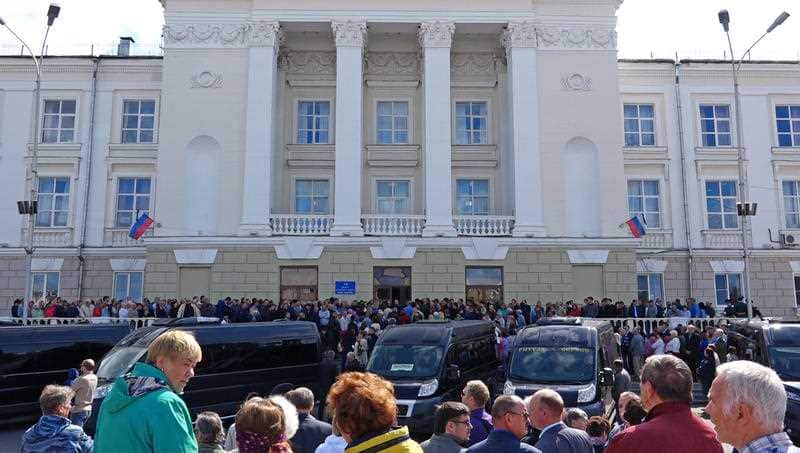 People gather for the funerals of five Russian nuclear engineers killed by a rocket explosion in Sarov